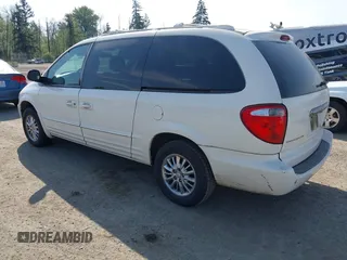 2003 Chrysler Town & Country Limited with VIN 2C8GP64L13R205501, listed as a IAAI auction lot 42131935 with 158,009 mi miles. Bid and sale history available at carsss.com. Image 3.