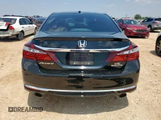 2016 Honda Accord Touring with VIN 1HGCR3F9XGA012737, listed as a Copart auction lot 58274935 with 69,715 mi miles and Salvage title. Bid and sale history available at DreamBid. Image 6.