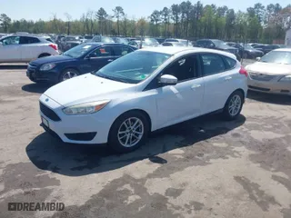 2015 Ford Focus SE with VIN 1FADP3K21FL246601, listed as a IAAI auction lot 41985398 with 139,782 mi miles. Bid and sale history available at carsss.com. Image 2.
