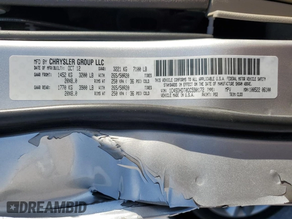 2013 Dodge Durango Crew with VIN 1C4SDHDT0DC590172, listed as a Copart auction lot 80140034 with 135,078 mi miles and Salvage title. Bid and sale history available at DreamBid. Image 13.