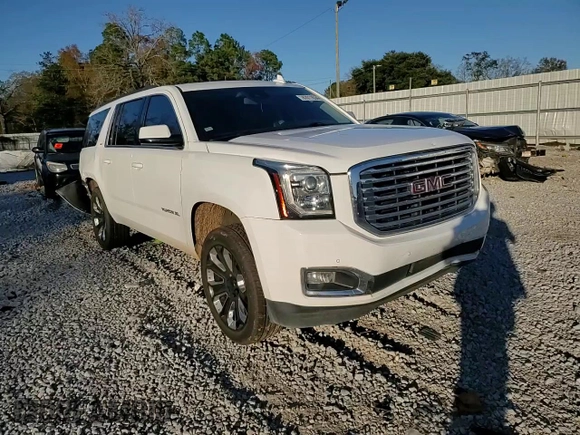 2020 GMC Yukon XL SLT with VIN 1GKS1GKC1LR172886, listed as a Copart auction lot 87011634 with 90,833 mi miles and Salvage Title. Bid and sale history available at carsss.com. Image 12.
