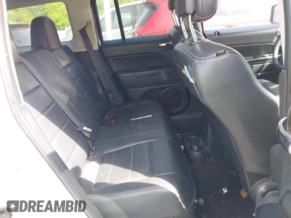 2015 Jeep Patriot Latitude with VIN 1C4NJRFB4FD394829, listed as a IAAI auction lot 42252571 with 113,071 mi miles and . Bid and sale history available at DreamBid. Image 8.
