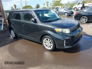 2014 Scion xB with VIN JTLZE4FE4EJ064549, listed as a IAAI auction lot 41392280 with 148,962 mi miles. Bid and sale history available at carsss.com. Image 1.