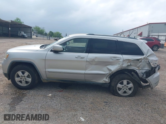 2011 Jeep Grand Cherokee Laredo with VIN 1J4RS4GGXBC564035, listed as a IAAI auction lot 41931861 with 242,291 mi miles and . Bid and sale history available at DreamBid. Image 17.