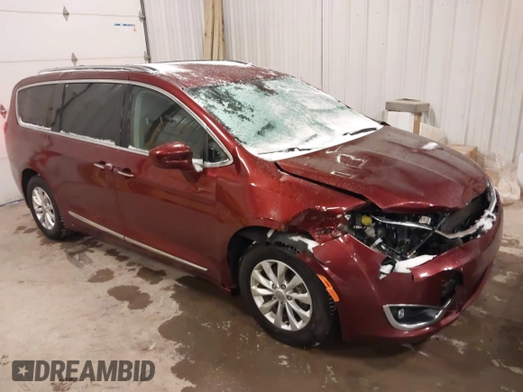 2018 Chrysler Pacifica Touring L Plus z VIN 2C4RC1EG5JR227511, wystawiony jako IAAI lot #41344075 z przebiegiem 86 860 mil mil oraz . Historia ofert i sprzedaży dostępna na DreamBid. Obrazek 1.
