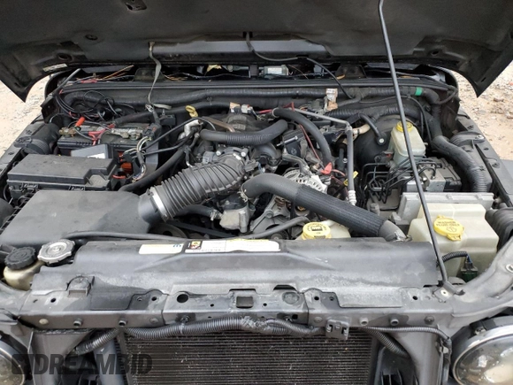 2007 Jeep Wrangler Unlimited Sahara with VIN 1J4GB59157L205933, listed as a Copart auction lot 49092795 with 364,193 mi miles and Salvage title. Bid and sale history available at DreamBid. Image 11.