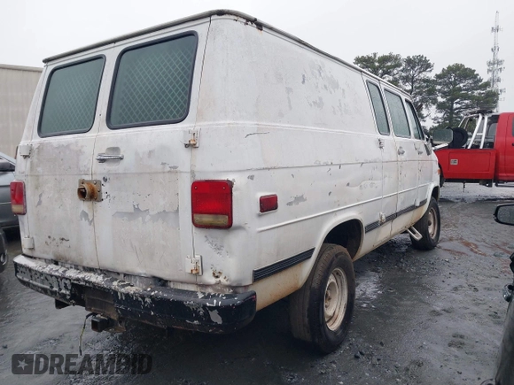 1993 GMC Van z VIN 1GTEG25H1PF507914, wystawiony jako IAAI lot #41546672 z przebiegiem 226 974 mil mil oraz . Historia ofert i sprzedaży dostępna na DreamBid. Obrazek 4.