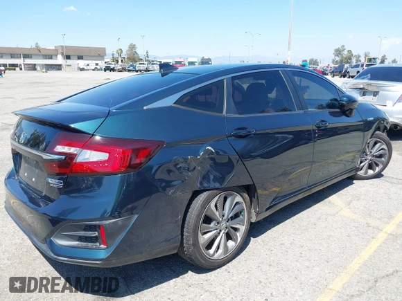 2018 Honda Clarity Plug-In Hybrid Touring with VIN JHMZC5F39JC022655, listed as a IAAI auction lot 42149002 with 118,913 mi miles. Bid and sale history available at carsss.com. Image 4.