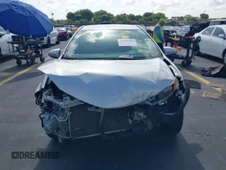 2016 Toyota Corolla L with VIN 5YFBURHE4GP416666, listed as a IAAI auction lot 42278304 with 120,638 mi miles and . Bid and sale history available at DreamBid. Image 6.