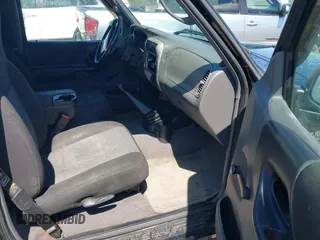 2003 Ford Ranger XL with VIN 1FTYR10D13PB63124, listed as a IAAI auction lot 41876969 with 164,574 mi miles. Bid and sale history available at carsss.com. Image 5.
