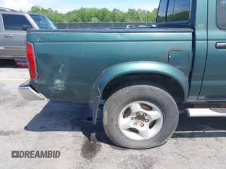 2000 Nissan Frontier XE with VIN 1N6ED27T2YC353126, listed as a IAAI auction lot 42092445 with 189,992 mi miles and . Bid and sale history available at DreamBid. Image 13.