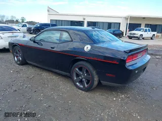 2013 Dodge Challenger R/T with VIN 2C3CDYBT0DH667924, listed as a IAAI auction lot 41278844 with 234,218 mi miles. Bid and sale history available at carsss.com. Image 3.