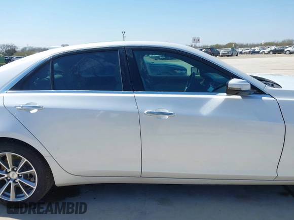 2017 Cadillac CTS Luxury RWD with VIN 1G6AR5SS7H0145637, listed as a IAAI auction lot 41689827 with 54,576 mi miles and . Bid and sale history available at DreamBid. Image 14.