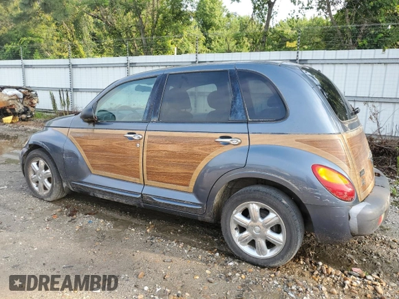 2002 Chrysler PT Cruiser Limited with VIN 3C8FY68B52T388195, listed as a Copart auction lot 64740274 with Not Provided miles and Salvage Title. Bid and sale history available at DreamBid. Image 2.