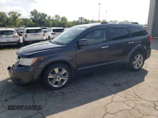 2014 Dodge Journey Limited with VIN 3C4PDCDG0ET185107, listed as a Copart auction lot 69748174 with 112,643 mi miles and Salvage Title. Bid and sale history available at DreamBid. Image 1.