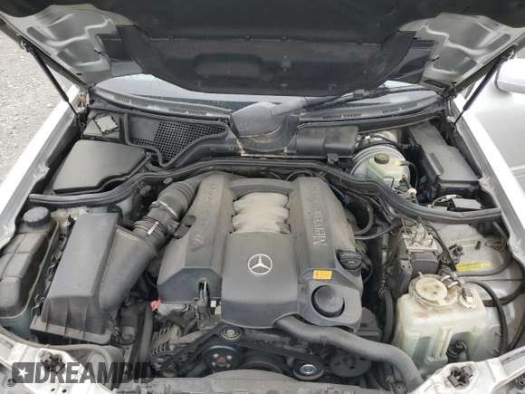 2000 Mercedes-Benz E 320 with VIN WDBJF65J1YB099417, listed as a Copart auction lot 54656915 with 130,387 mi miles and Salvage Title. Bid and sale history available at DreamBid. Image 11.