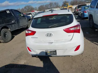 2014 Hyundai Elantra GT with VIN KMHD35LH6EU180152, listed as a IAAI auction lot 41674456 with 113,763 mi miles. Bid and sale history available at carsss.com. Image 16.