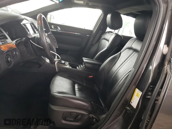 2016 Lincoln MKS z VIN 1LNHL9DK9GG601740, wystawiony jako Copart lot #60557565 z przebiegiem 89 350 mil mil oraz Szkoda całkowita • Salvage title. Historia ofert i sprzedaży dostępna na DreamBid. Obrazek 7.