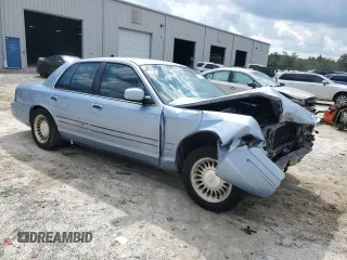 1998 Ford Crown Victoria LX с VIN 2FAFP74W3WX162752, выставлен на аукционе Copart как лот 72498904 с пробегом Не указан миль и Списание • Salvage title. История ставок и продаж доступна на DreamBid. Изображение 4.