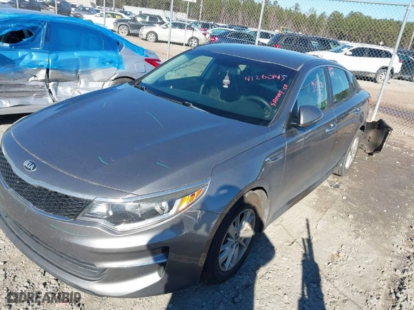 2018 Kia Optima S with VIN 5XXGT4L39JG192313, listed as a IAAI auction lot 41260143 with 138,413 mi miles. Bid and sale history available at carsss.com. Image 2.