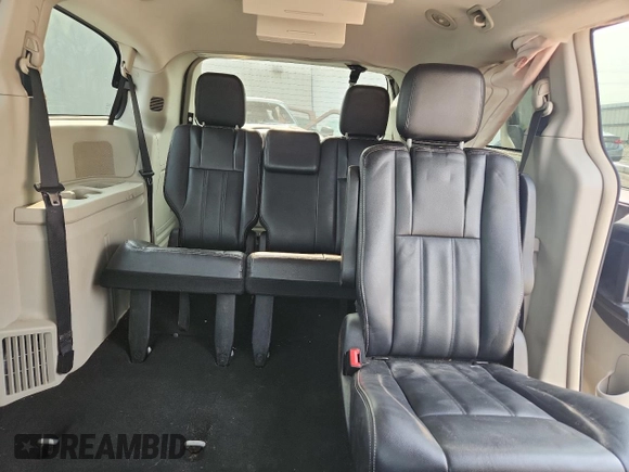 2013 Chrysler Town & Country Touring z VIN 2C4RC1BG6DR665222, wystawiony jako Copart lot #59417135 z przebiegiem 169 833 mil mil oraz Nie do naprawy • Non repairable. Historia ofert i sprzedaży dostępna na DreamBid. Obrazek 10.