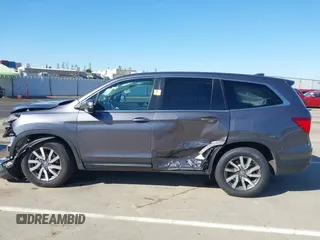 2020 Honda Pilot EX-L with VIN 5FNYF5H51LB020830, listed as a IAAI auction lot 42255746 with 60,503 mi miles and . Bid and sale history available at DreamBid. Image 15.