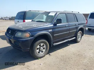 2002 Mitsubishi Montero ES z VIN JA4LS21H72J064812, wystawiony jako IAAI lot #42395976 z przebiegiem 131 436 mil mil oraz . Historia ofert i sprzedaży dostępna na DreamBid. Obrazek 2.