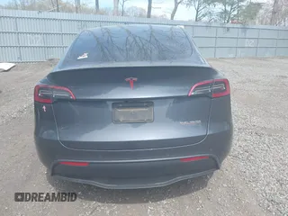 2022 Tesla Model Y Performance with VIN 7SAYGDEF3NF324705, listed as a IAAI auction lot 42076565 with 66,573 mi miles and . Bid and sale history available at carsss.com. Image 16.