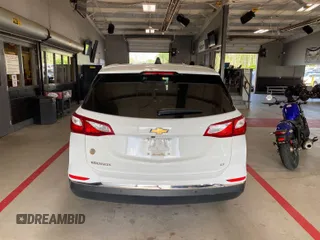 2021 Chevrolet Equinox LT with VIN 3GNAXJEV3MS121427, listed as a IAAI auction lot 42624683 with 46,434 mi miles and . Bid and sale history available at DreamBid. Image 2.
