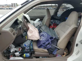 1996 Toyota Tercel DX z VIN JT2AC52L5T0145290, wystawiony jako Copart lot #45027855 z przebiegiem 186 673 mil mil oraz Szkoda całkowita • Salvage title. Historia ofert i sprzedaży dostępna na DreamBid. Obrazek 7.