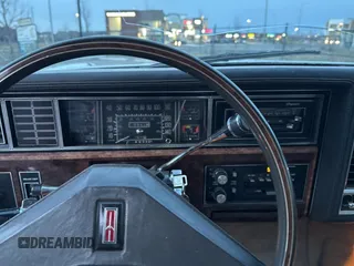 1983 Oldsmobile Toronado with VIN 1G3AZ57Y7DE313767, listed as a Copart auction lot 54109855 with 15,963 mi miles and Clean Title. Bid and sale history available at DreamBid. Image 9.