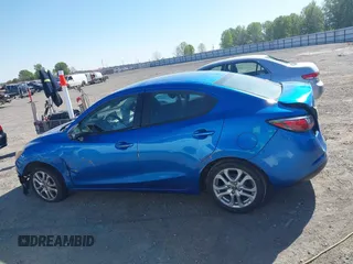 2016 Scion iA z VIN 3MYDLBZV9GY114065, wystawiony jako IAAI lot #42002937 z przebiegiem 187 582 mil mil oraz . Historia ofert i sprzedaży dostępna na DreamBid. Obrazek 13.