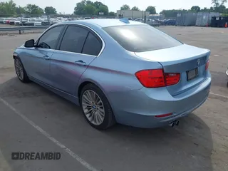 2014 BMW 3 Series 328i z VIN WBA3A5G5XENP31728, wystawiony jako IAAI lot #42446341 z przebiegiem 134 141 mil mil oraz . Historia ofert i sprzedaży dostępna na DreamBid. Obrazek 3.