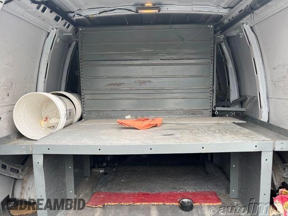 2014 Chevrolet Express Cargo with VIN 1GCWGFCA5E1181689, listed as a IAAI auction lot 42835597 with 157,826 mi miles and . Bid and sale history available at DreamBid. Image 12.