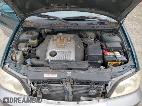2004 Kia Sedona LX with VIN KNDUP131446581402, listed as a Copart auction lot 68083144 with 171,868 mi miles and Clean Title. Bid and sale history available at carsss.com. Image 12.