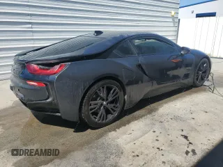 2015 BMW i8 z VIN WBY2Z2C57FV391448, wystawiony jako Copart lot #49895954 z przebiegiem 84 874 mil mil oraz . Historia ofert i sprzedaży dostępna na DreamBid. Obrazek 3.