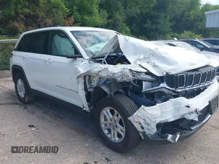 2023 Jeep Grand Cherokee Laredo with VIN 1C4RJHAG1PC641102, listed as a IAAI auction lot 42457130 with 50,533 mi miles and . Bid and sale history available at DreamBid. Image 1.
