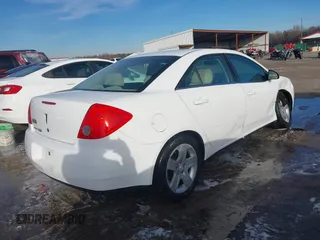 2009 Pontiac G6 1SA z VIN 1G2ZG57B394187803, wystawiony jako IAAI lot #41100404 z przebiegiem 242 388 mil mil oraz . Historia ofert i sprzedaży dostępna na DreamBid. Obrazek 4.