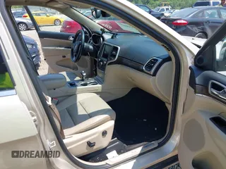 2014 Jeep Grand Cherokee Limited z VIN 1C4RJFBG9EC162684, wystawiony jako IAAI lot #42491647 z przebiegiem 152 328 mil mil oraz . Historia ofert i sprzedaży dostępna na DreamBid. Obrazek 5.