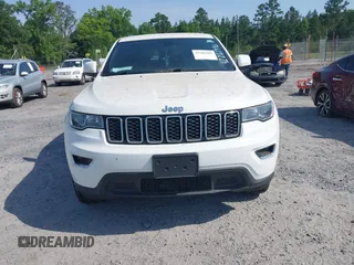 2020 Jeep Grand Cherokee Laredo E with VIN 1C4RJFAG1LC389026, listed as a IAAI auction lot 42261396 with 100,409 mi miles and . Bid and sale history available at DreamBid. Image 12.