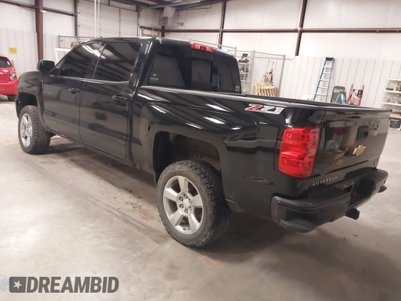 2017 Chevrolet Silverado 1500 LT with VIN 3GCUKREC6HG501307, listed as a IAAI auction lot 41611899 with 133,863 mi miles and . Bid and sale history available at DreamBid. Image 3.