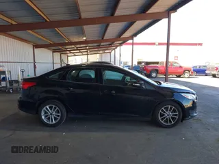 2017 Ford Focus SE with VIN 1FADP3F26HL219875, listed as a IAAI auction lot 41756026 with 70,493 mi miles. Bid and sale history available at carsss.com. Image 13.