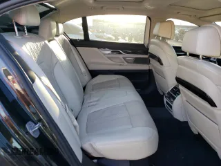2016 BMW 7 Series 740i with VIN WBA7E2C59GG504533, listed as a Copart auction lot 77122283 with 68,209 mi miles. Bid and sale history available at carsss.com. Image 10.