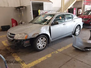 2014 Dodge Avenger SE with VIN 1C3CDZAB4EN161536, listed as a IAAI auction lot 41604009 with 107,957 mi miles. Bid and sale history available at carsss.com. Image 2.