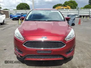 2015 Ford Focus SE z VIN 1FADP3F24FL332883, wystawiony jako Copart lot #64429655 z przebiegiem 65 939 mil mil oraz Szkoda całkowita • Salvage title. Historia ofert i sprzedaży dostępna na DreamBid. Obrazek 5.