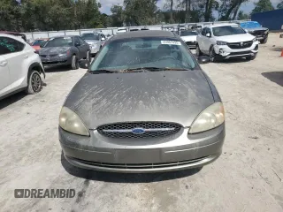 2001 Ford Taurus z VIN 1FAFP52231A266843, wystawiony jako Copart lot #45967495 z przebiegiem 80 057 mil mil oraz Czysty tytuł • Clean title. Historia ofert i sprzedaży dostępna na DreamBid. Obrazek 5.