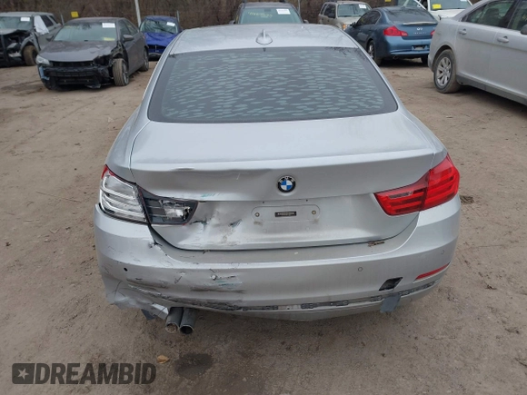 2014 BMW 4 Series 428i xDrive with VIN WBA3N5C53EF716542, listed as a IAAI auction lot 41157641 with 135,264 mi miles and . Bid and sale history available at DreamBid. Image 6.