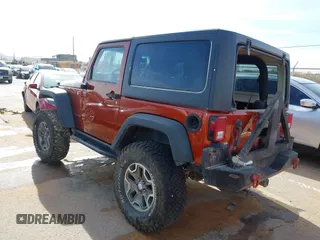 2014 Jeep Wrangler Rubicon with VIN 1C4BJWCG8EL185597, listed as a IAAI auction lot 41914489 with 85,545 mi miles and . Bid and sale history available at DreamBid. Image 3.