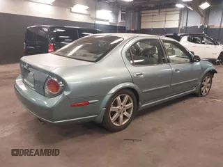2002 Nissan Maxima GLE z VIN JN1DA31A12T308581, wystawiony jako IAAI lot #41742949 z przebiegiem 116 892 mil mil oraz . Historia ofert i sprzedaży dostępna na DreamBid. Obrazek 4.