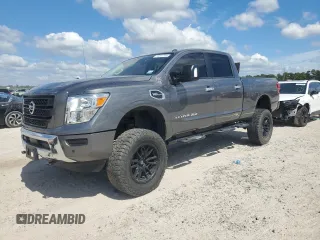 2021 Nissan Titan XD SV with VIN 1N6AA1FB4MN519784, listed as a Copart auction lot 74893744 with 45,245 mi miles and Salvage Title. Bid and sale history available at carsss.com. Image 1.